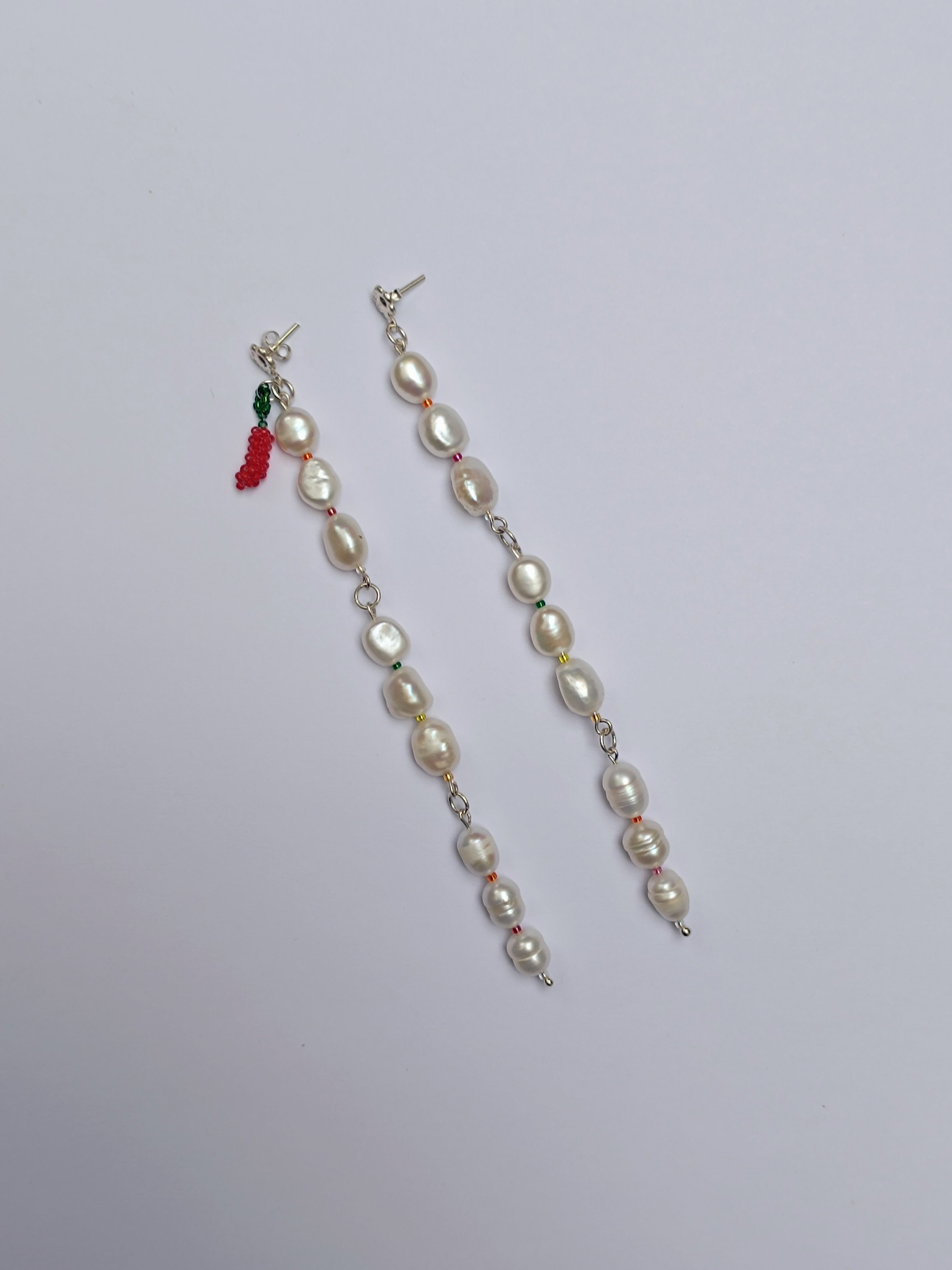 Aretes perlas ascendentes